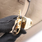 Louis Vuitton Alma PM Monogram Empreinte Neo 2Way Handbag in Beige M44885