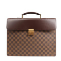 Louis Vuitton Damier Ebene Altona PM Handbag N53315 featuring brown checkered canvas, a dark leather flap, top handle, and gold-tone push-lock closure, displayed against a white background.