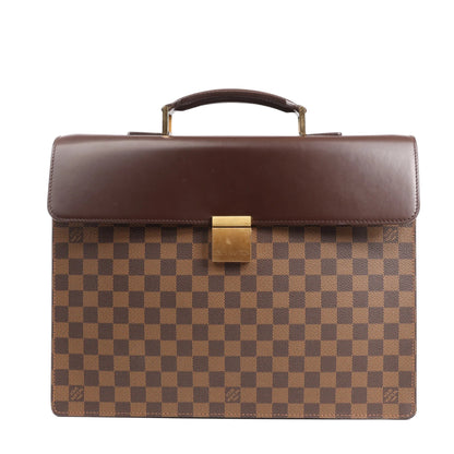 Louis Vuitton Damier Ebene Altona PM Handbag N53315 featuring brown checkered canvas, a dark leather flap, top handle, and gold-tone push-lock closure, displayed against a white background.