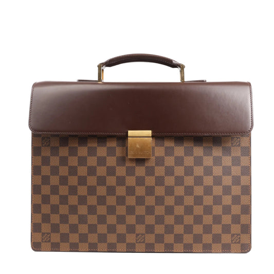 Louis Vuitton Damier Ebene Altona PM Handbag N53315 featuring brown checkered canvas, a dark leather flap, top handle, and gold-tone push-lock closure, displayed against a white background.