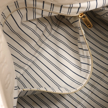 Louis Vuitton Monogram Empreinte Artsy MM Shoulder Bag in Beige M93449