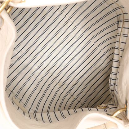 Louis Vuitton Monogram Empreinte Artsy MM Shoulder Bag in Beige M93449