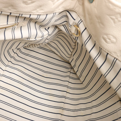 Louis Vuitton Monogram Empreinte Artsy MM Shoulder Bag in Beige M93449