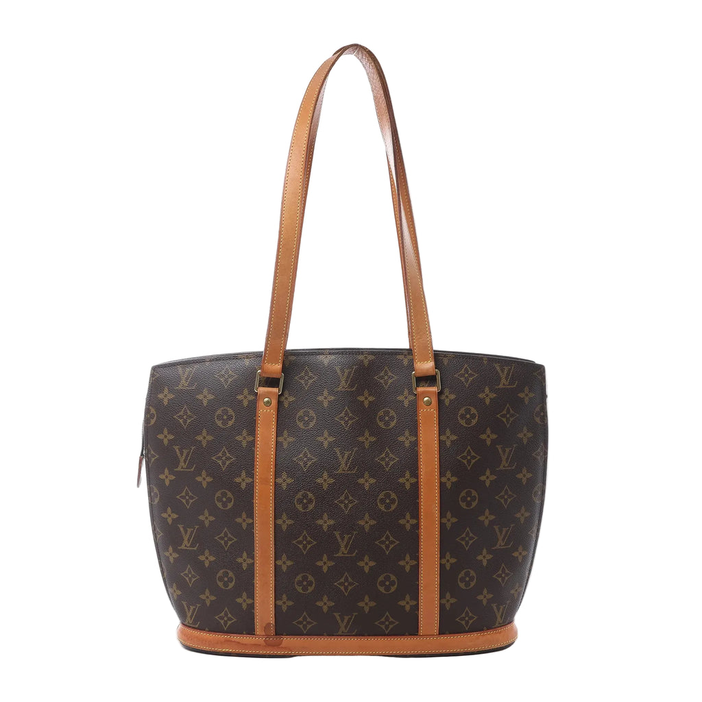 Louis Vuitton Babylone shoulder bag in brown Monogram canvas with tan vachetta leather straps, gold-tone hardware, and structured tote silhouette on white background.