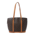 Louis Vuitton Babylone shoulder bag in brown Monogram canvas with tan vachetta leather straps, gold-tone hardware, and structured tote silhouette on white background.