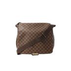 Louis Vuitton Bastille messenger bag in brown Damier Ebene check canvas with flap front, dark brown adjustable web shoulder strap, and gold-tone hardware on white background.