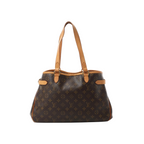 Louis Vuitton Batignolles Horizontal shoulder bag in brown Monogram canvas with tan leather straps and side buckle tabs on white background