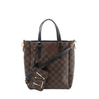 Louis Vuitton Belmont PM Damier Ebene checkered handbag with black leather top handles, detachable shoulder strap, gold-tone hardware, and matching zip pouch, front view on white background.