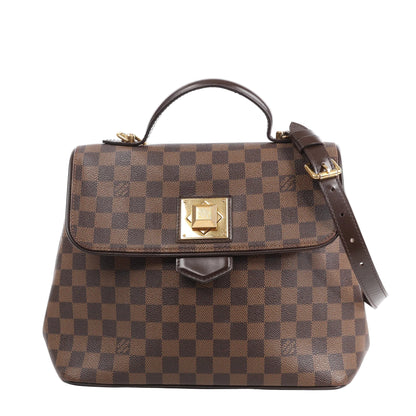 Louis Vuitton Bergamo MM handbag N41168 in Damier Ebene brown checkered canvas with dark leather trim, top handle, detachable shoulder strap, and gold-tone push-lock closure against a white background.
