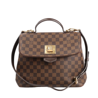 Louis Vuitton Bergamo PM handbag in brown Damier Ebene coated canvas with checkered pattern, structured silhouette, top handle, adjustable shoulder strap, and gold-tone S-lock closure.