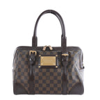 Louis Vuitton Berkeley brown Damier Ebene checkerboard shoulder bag with dark leather trim, twin top handles and gold-tone hardware.
