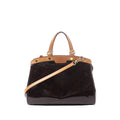 Front view of Louis Vuitton Amarante Vernis Blair MM handbag with tan leather trim, top handles, gold-tone studs and a detachable shoulder strap on a white background.