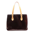 Amarante purple Louis Vuitton Brentwood Vernis leather tote with embossed Monogram pattern, natural leather shoulder straps and gold-tone buckles.