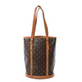 Louis Vuitton Bucket GM shoulder bag in brown Monogram canvas with tan leather trim, long adjustable straps and a round structured base.