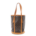 Louis Vuitton Bucket GM brown Monogram canvas shoulder bag with tan leather trim, long adjustable straps and rounded base.