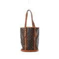 Louis Vuitton Bucket GM shoulder bag in brown Monogram canvas with tan leather trim, long adjustable straps and a round structured base.