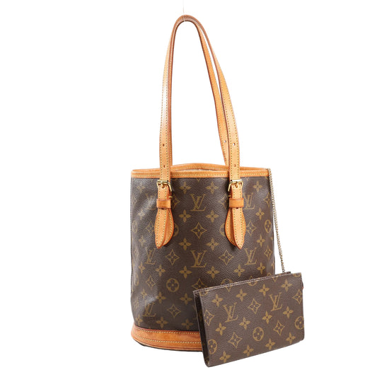 Louis Vuitton Monogram Canvas Bucket PM shoulder bag in brown with natural vachetta leather trim, gold-tone hardware, and detachable matching pouch, standing upright.