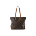 Louis Vuitton Cabas Mezzo brown Monogram canvas tote with tan leather shoulder straps, front view on white background.
