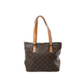 Louis Vuitton Cabas Piano tote in brown Monogram canvas with tan leather shoulder straps on white background