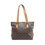 Louis Vuitton Cabas Piano shoulder bag in brown Monogram coated canvas with natural cowhide leather shoulder straps, leather trim, and gold-tone hardware on a white background.