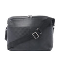 Louis Vuitton Calypso MM black Damier Infini leather messenger bag with smooth leather trim, double zip closure and adjustable logo strap.