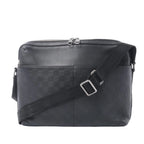 Louis Vuitton Calypso MM black Damier Infini leather messenger bag with smooth leather trim, double zip closure and adjustable logo strap.