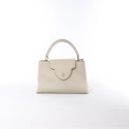 Louis Vuitton Capucines GM Taurillon Leather Handbag in Beige