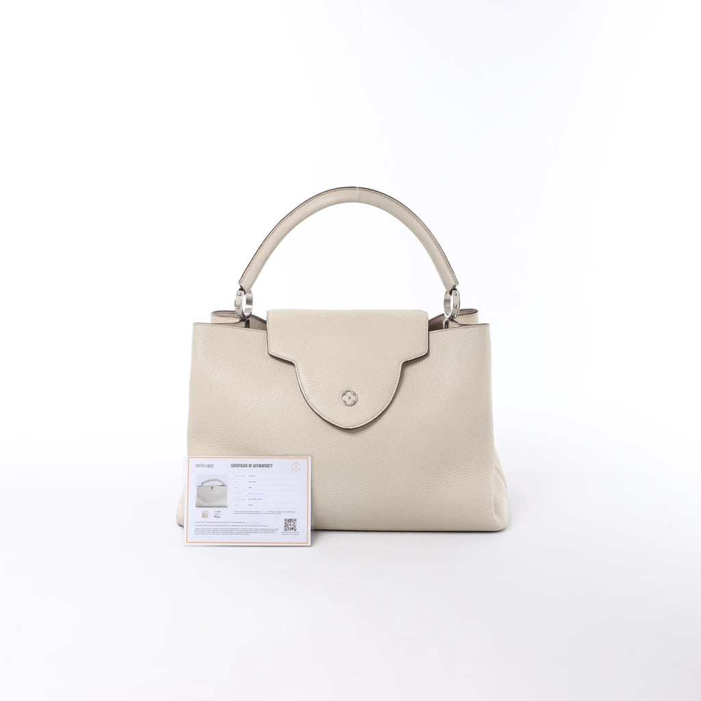 Louis Vuitton Capucines GM Taurillon Leather Handbag in Beige