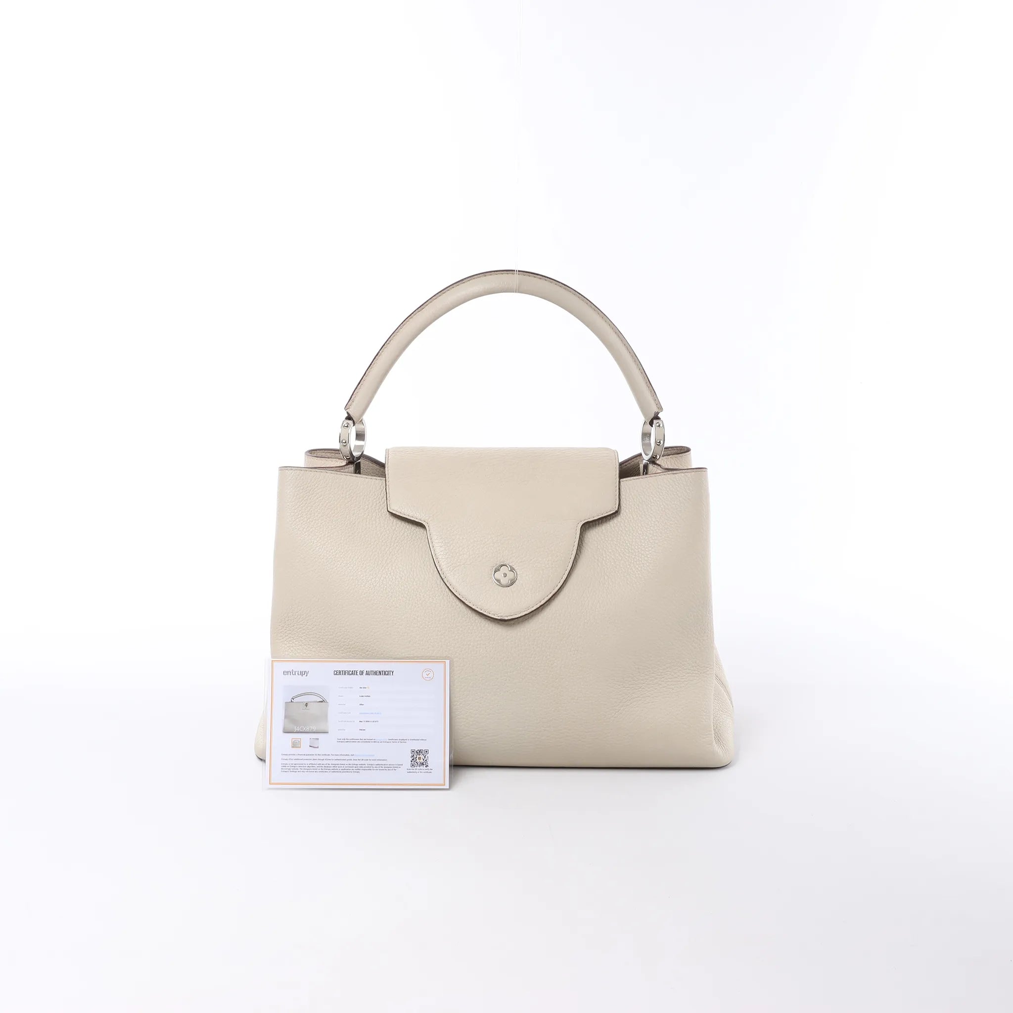 Louis Vuitton Capucines GM Taurillon Leather Handbag in Beige