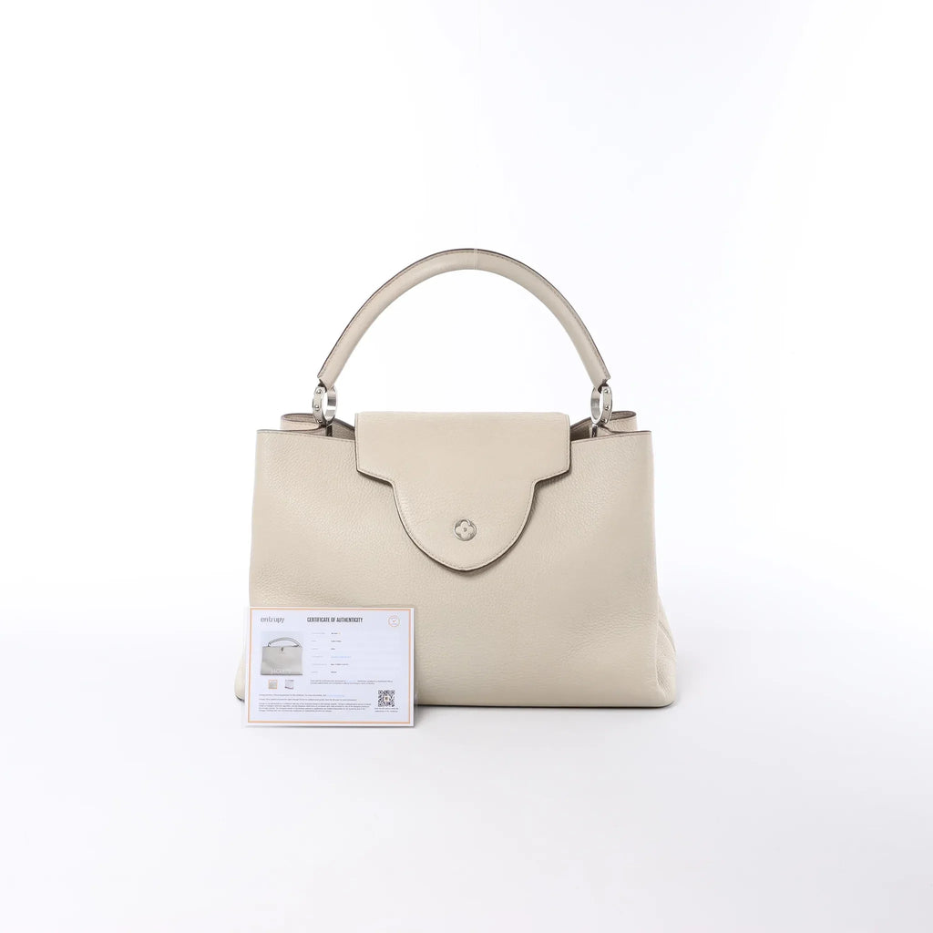 Louis Vuitton Capucines GM Taurillon Leather Handbag in Beige