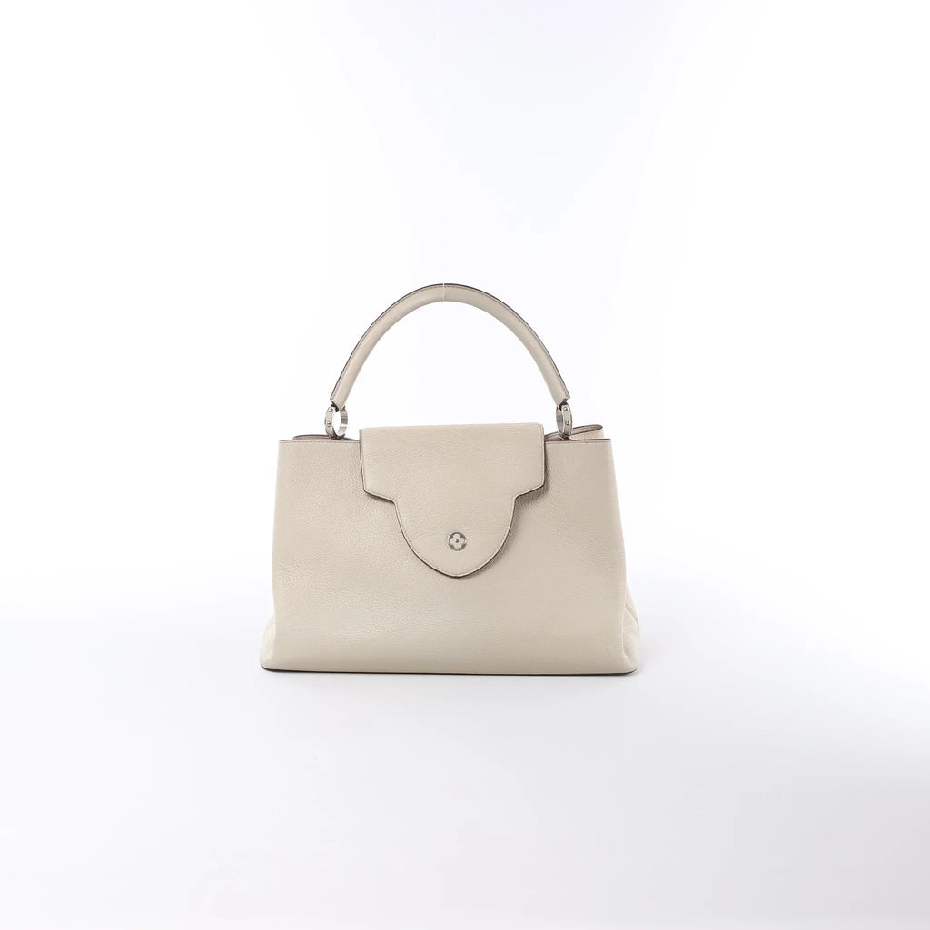 Louis Vuitton Capucines GM Taurillon Leather Handbag in Beige