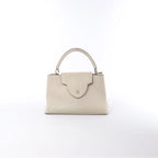 Louis Vuitton Capucines GM Taurillon Leather Handbag in Beige