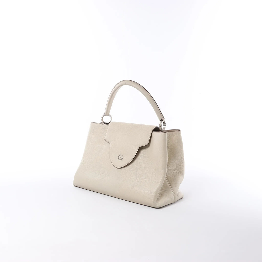 Louis Vuitton Capucines GM Taurillon Leather Handbag in Beige