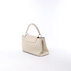 Louis Vuitton Capucines GM Taurillon Leather Handbag in Beige