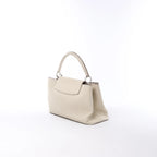 Louis Vuitton Capucines GM Taurillon Leather Handbag in Beige