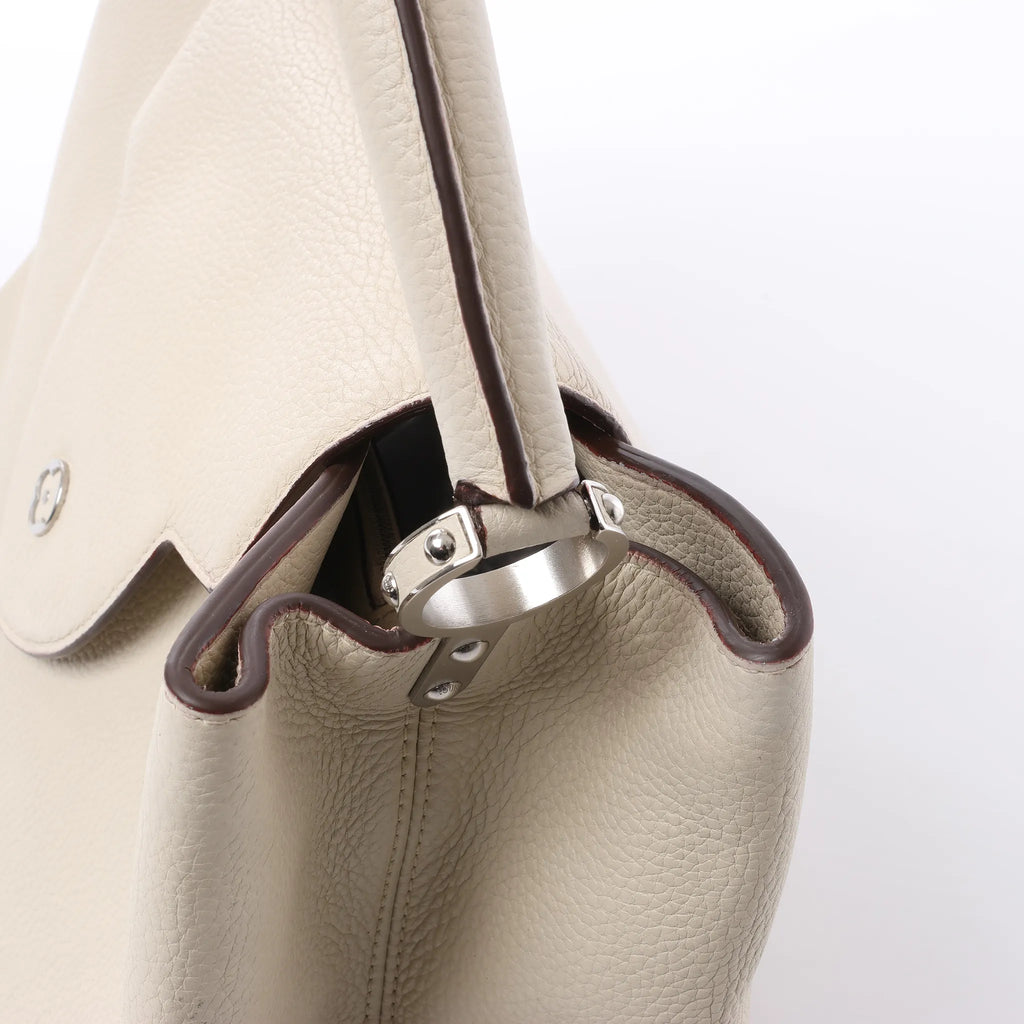 Louis Vuitton Capucines GM Taurillon Leather Handbag in Beige