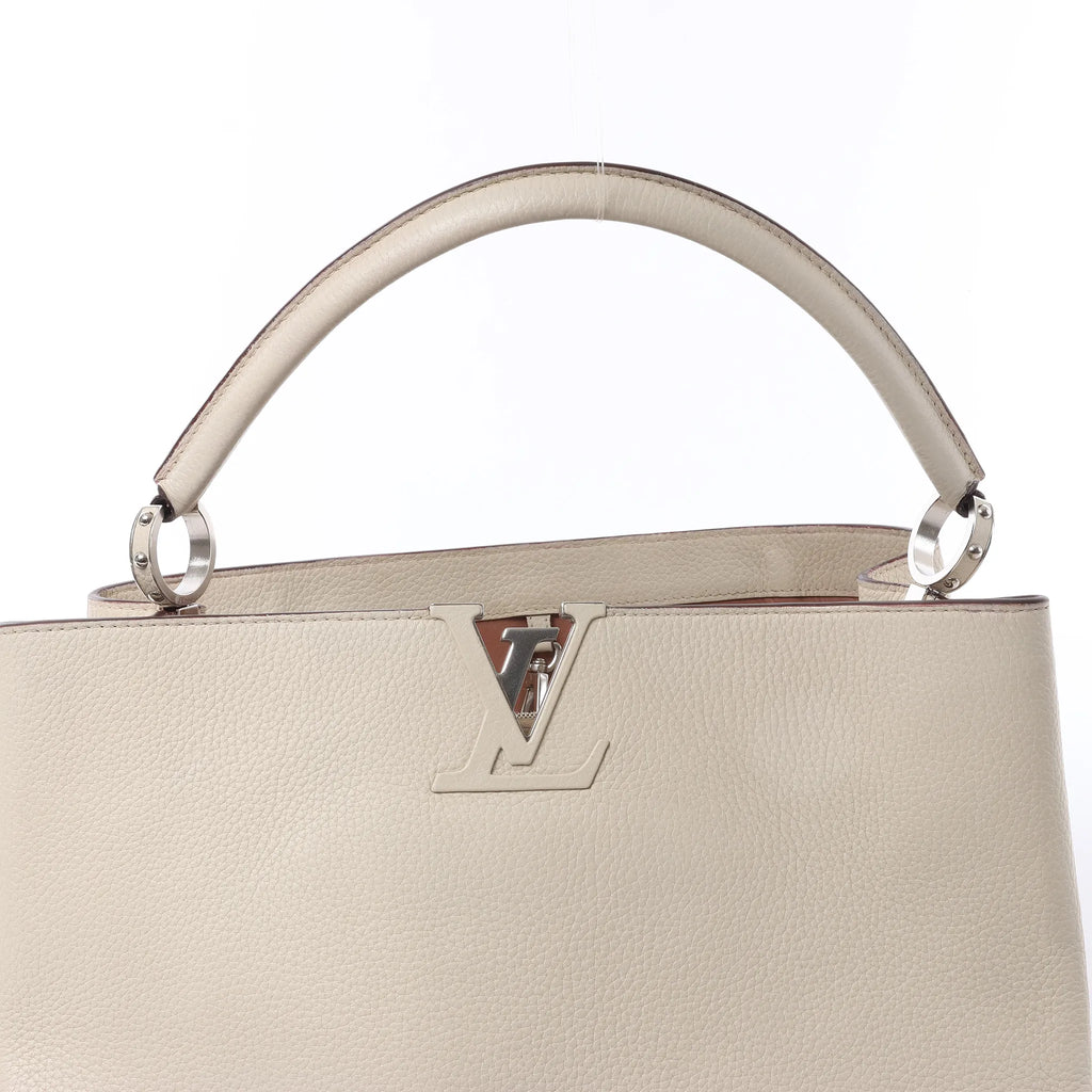Louis Vuitton Capucines GM Taurillon Leather Handbag in Beige