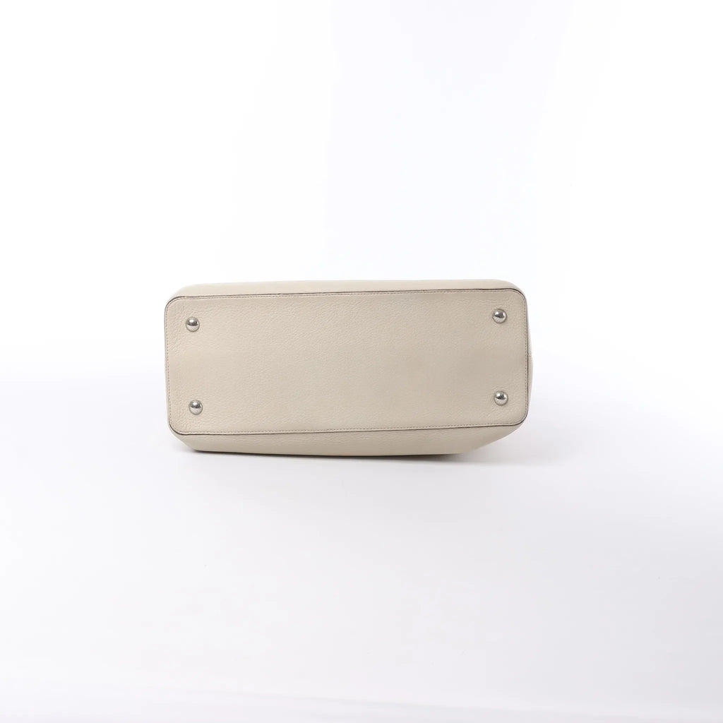 Louis Vuitton Capucines GM Taurillon Leather Handbag in Beige