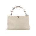 Louis Vuitton Capucines GM Taurillon Leather Handbag in Beige