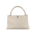 Louis Vuitton Capucines GM Taurillon Leather Handbag in Beige