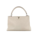 Louis Vuitton Capucines GM Taurillon Leather Handbag in Beige