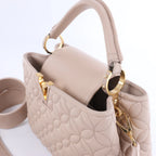 Bolso Louis Vuitton Capucines BB de piel Parnassea de 2 vías en beige M94688