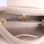 Bolso Louis Vuitton Capucines BB de piel Parnassea de 2 vías en beige M94688