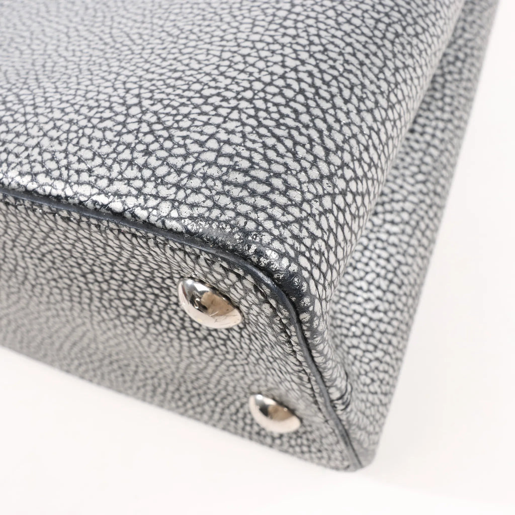 Louis Vuitton Taurillon Capucines MM Handbag in Silver