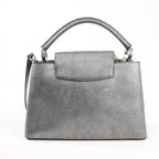 Louis Vuitton Taurillon Capucines MM Handbag in Silver
