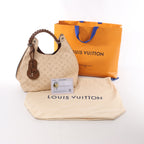 Louis Vuitton Carmel Perforated Mahina Leather Hobo Shoulder Bag in in Beige Crème M53188