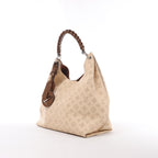 Louis Vuitton Carmel Perforated Mahina Leather Hobo Shoulder Bag in in Beige Crème M53188