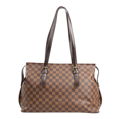 Louis Vuitton Chelsea shoulder bag in brown Damier Ebene coated canvas with dual adjustable leather shoulder straps, gold-tone hardware, and a spacious rectangular silhouette.