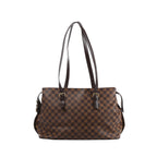Brown Louis Vuitton Chelsea Damier Ebene shoulder bag with long dark leather straps, buckle details and gold-tone hardware.
