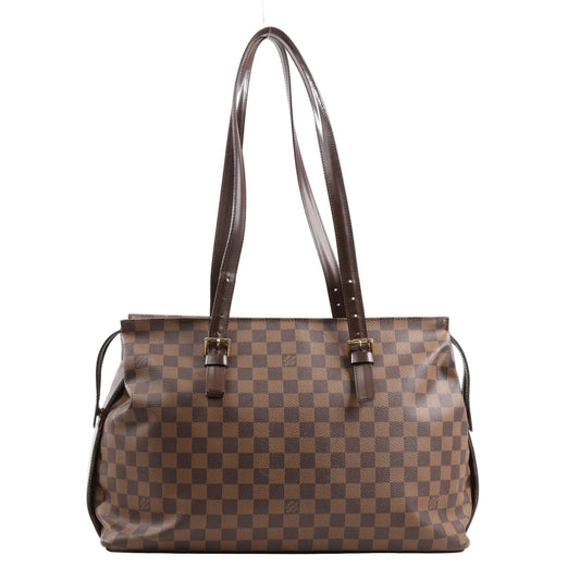 Louis Vuitton Damier Ebene Chelsea Shoulder Bag N51119 featuring brown checkered canvas, long adjustable dark brown leather shoulder straps with gold-tone buckles, and a roomy rectangular silhouette, displayed upright on a white background.